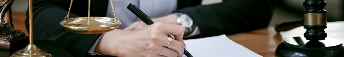 Justice lawyers, Businesswoman in suit or lawyer working on a documents. Legal law, advice and justice concept.